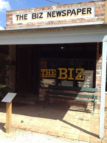 Outside view of the Biz Newspaper building in the Vintage Village
