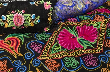 Close up of colourful traditional Uyghur fabrics