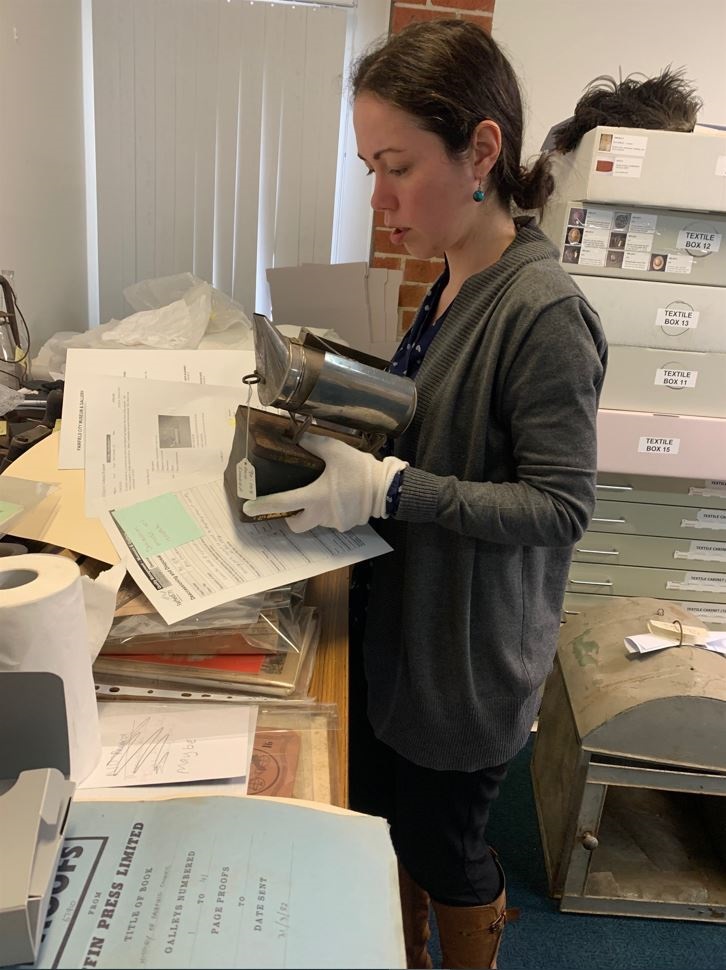 Intern Emilia Stubbs Grigoriou working with Heritage item